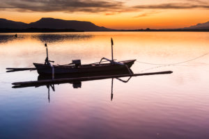 Bali Barat national park, fishing boat at sunrise Bali Barat national park, fishing boat at sunrise